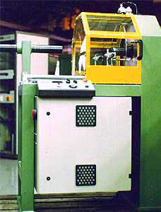 Central spinner for retaining coils SK 230
